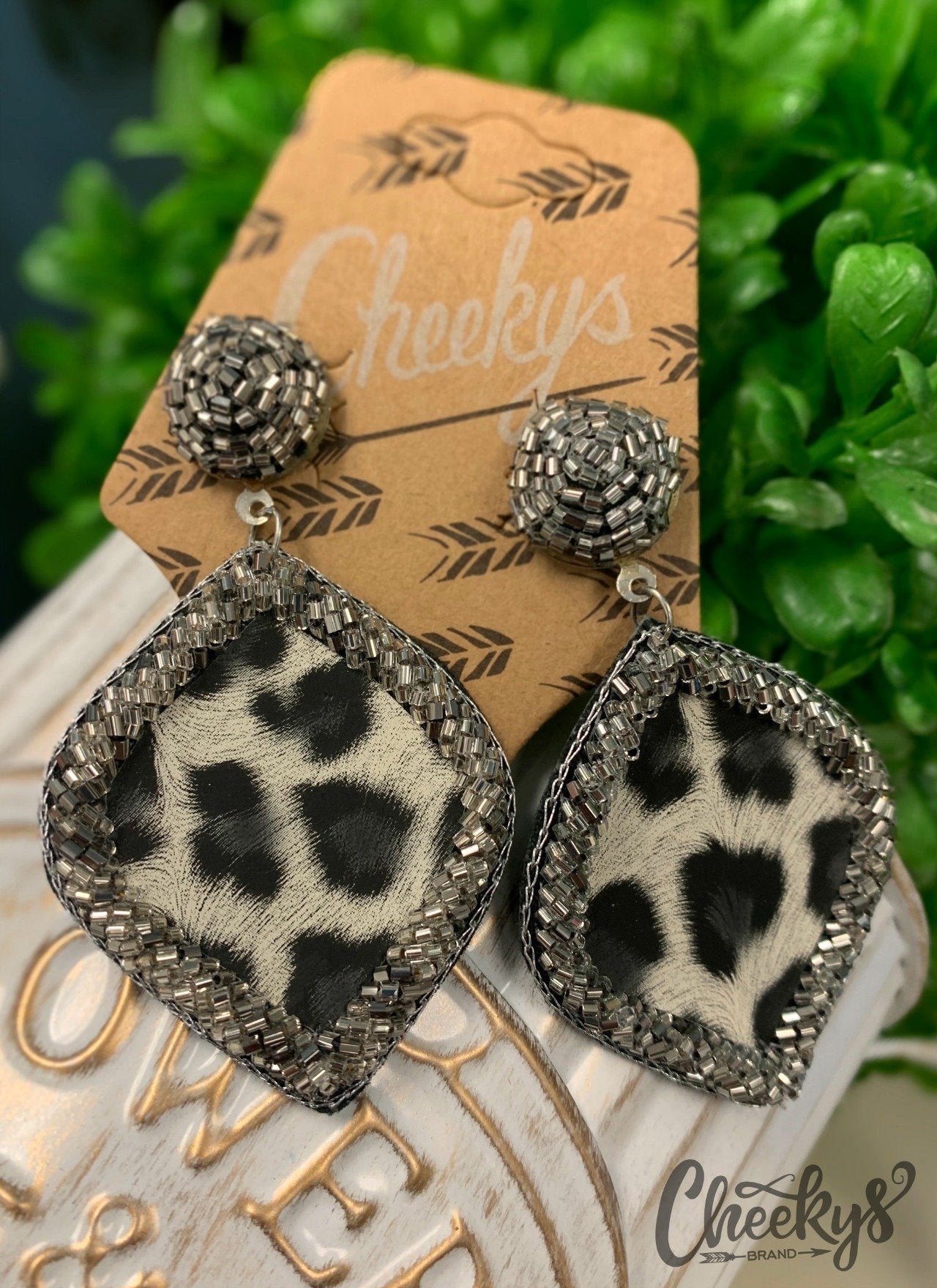 Natalia Snow Leopard Earrings Cheekys Original TWD Shirt Company